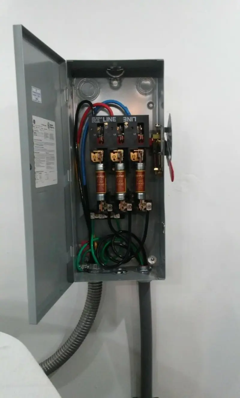 Three-phase disconnect switch installed for Smoke Detector Installation in Whitman
